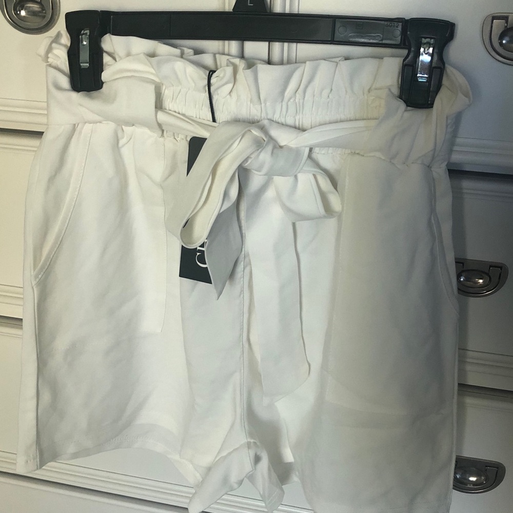 White Flowy shorts - never been worn!